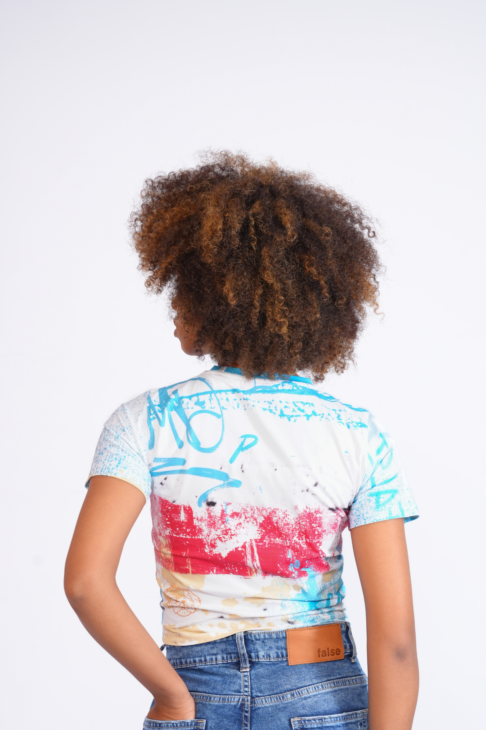 False spray graffiti baby tee